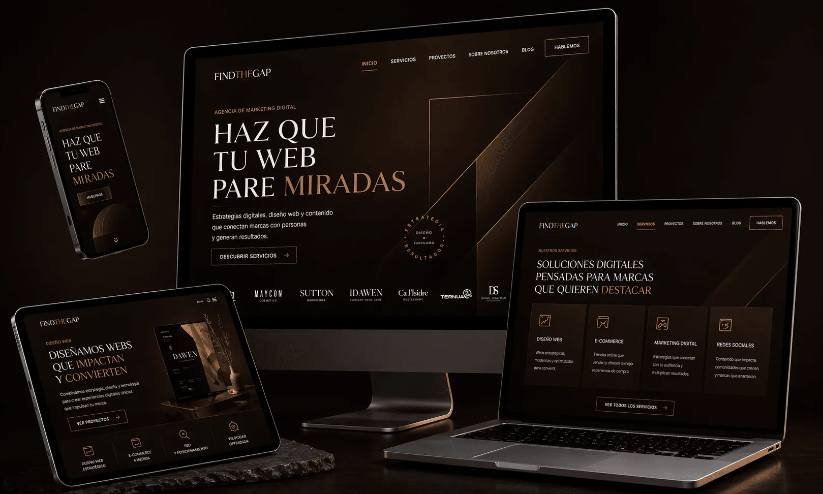 Diseño web responsivo de la agencia FINDTHEGAP visualizado en monitor, portátil, tableta y teléfono móvil